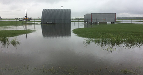 receding flood waters on field