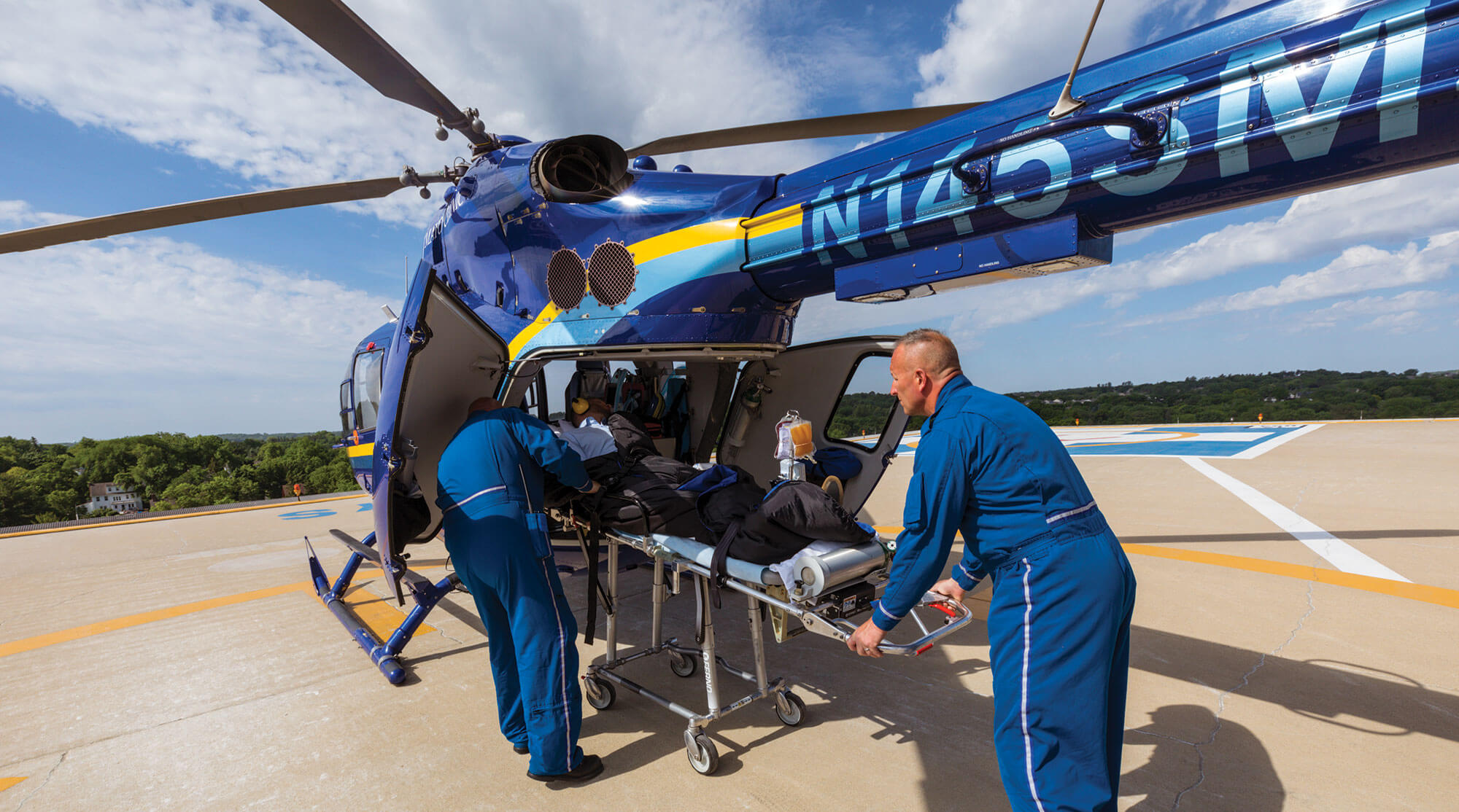 helo crew loading in a patient